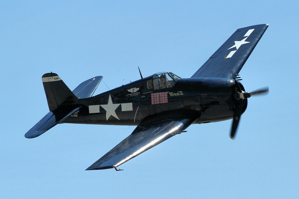 A restored Hellcat in Navy blue displays at the Chino Airshow, 2014.
