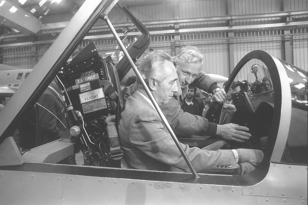 Israeli Prime Minister Shimon Peres in a Lavi cockpit a fighter that carried enormous national prestige.