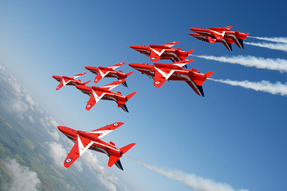 The Red Arrows roll inverted in tight formation the Hawks most famous role.