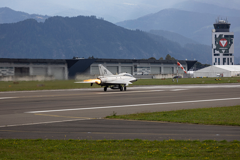 Full afterburner on take-off the licensed Avon and Swedish reheat pushing the Draken skyward.