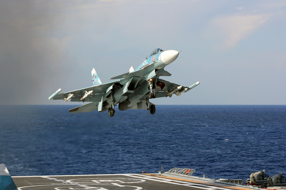 A Su-33 in flight the navalised Flanker with its distinctive canard foreplanes.