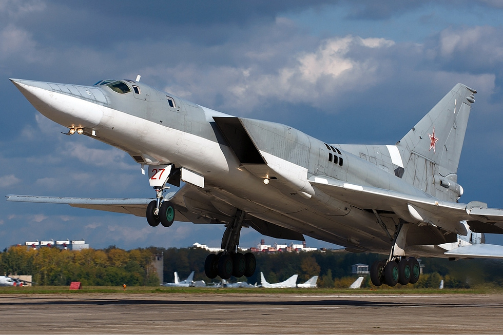 A Russian Air Force Tu-22M3 on takeoff, wings spread for lift.