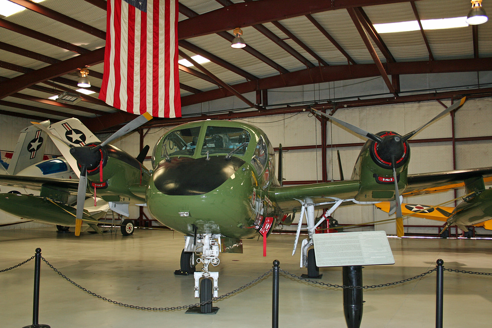 A restored Mohawk in Army camouflage, showing the distinctive triple tail.
