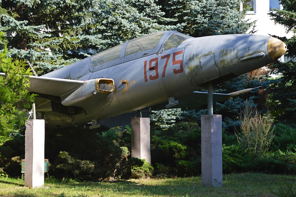 A TS-11 Iskra on static display the straight wing and tandem cockpit clearly visible.