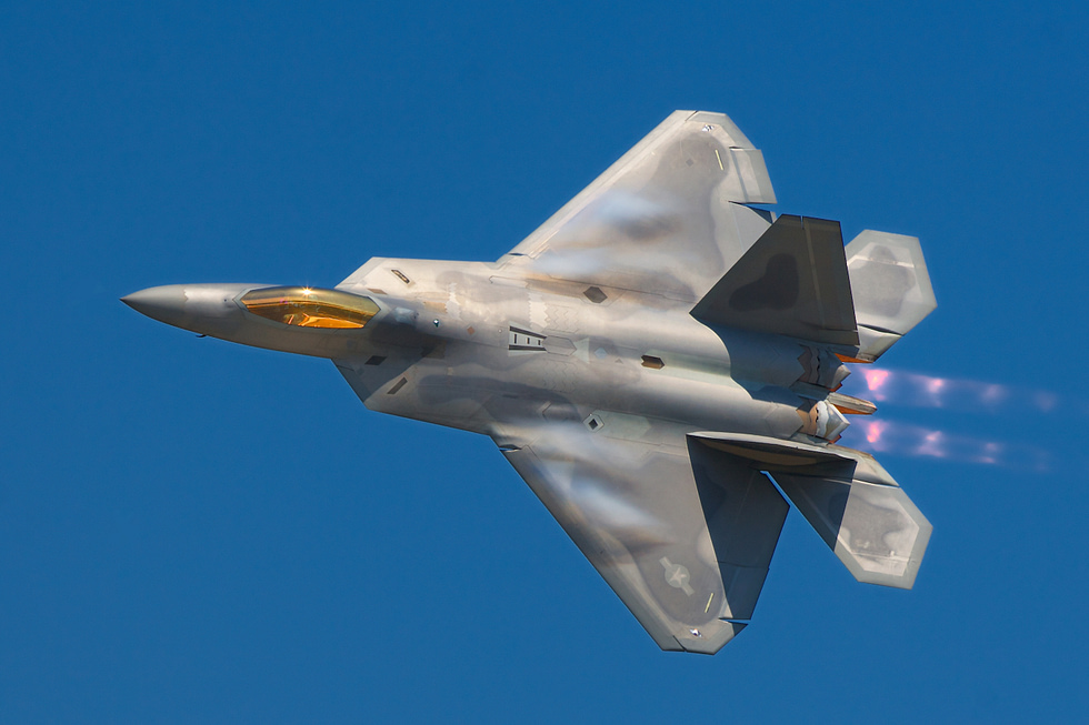 An F-22 Demo Team pass in full afterburner the maneuverability thrust vectoring unlocks.