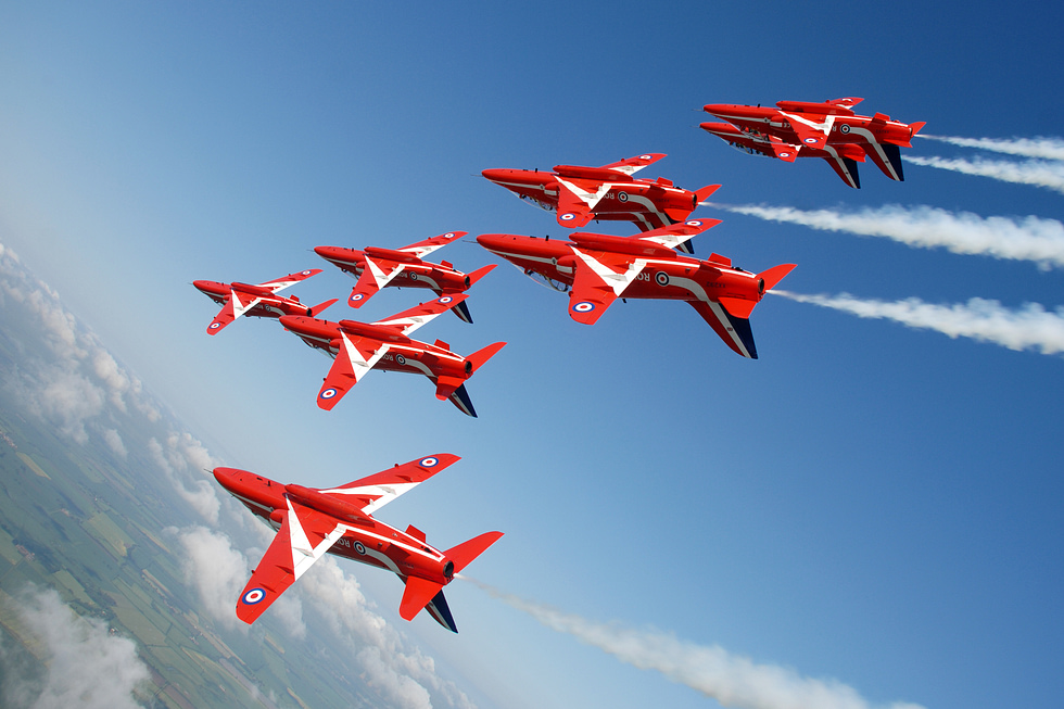 The Red Arrows roll inverted in tight formation the Hawks most famous role.