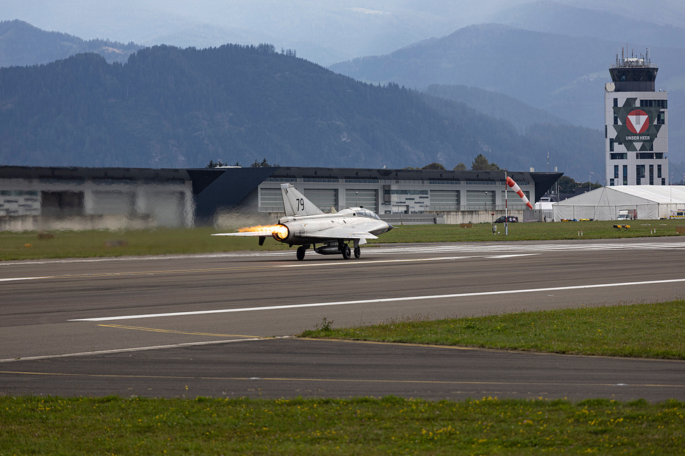 Full afterburner on take-off the licensed Avon and Swedish reheat pushing the Draken skyward.