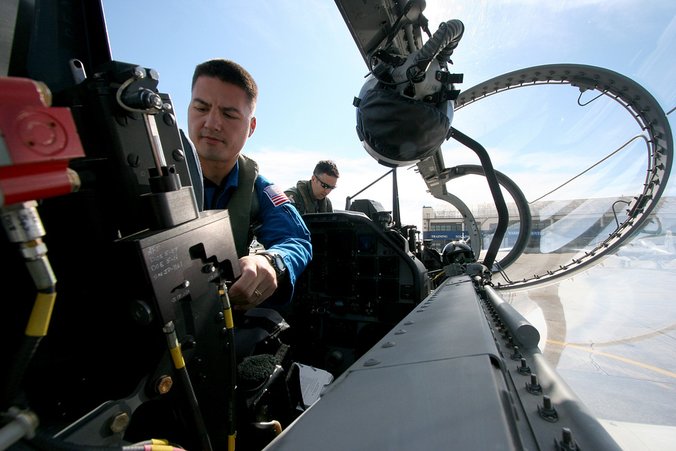The tandem cockpit of a T-6 Texan II, where student and instructor sit in line.
