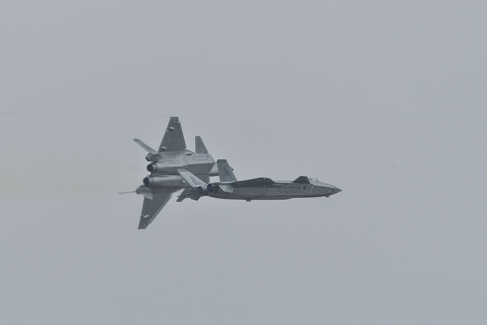 A pair of J-20s in formation the jet is now built in numbers no other non-US stealth fighter matches.