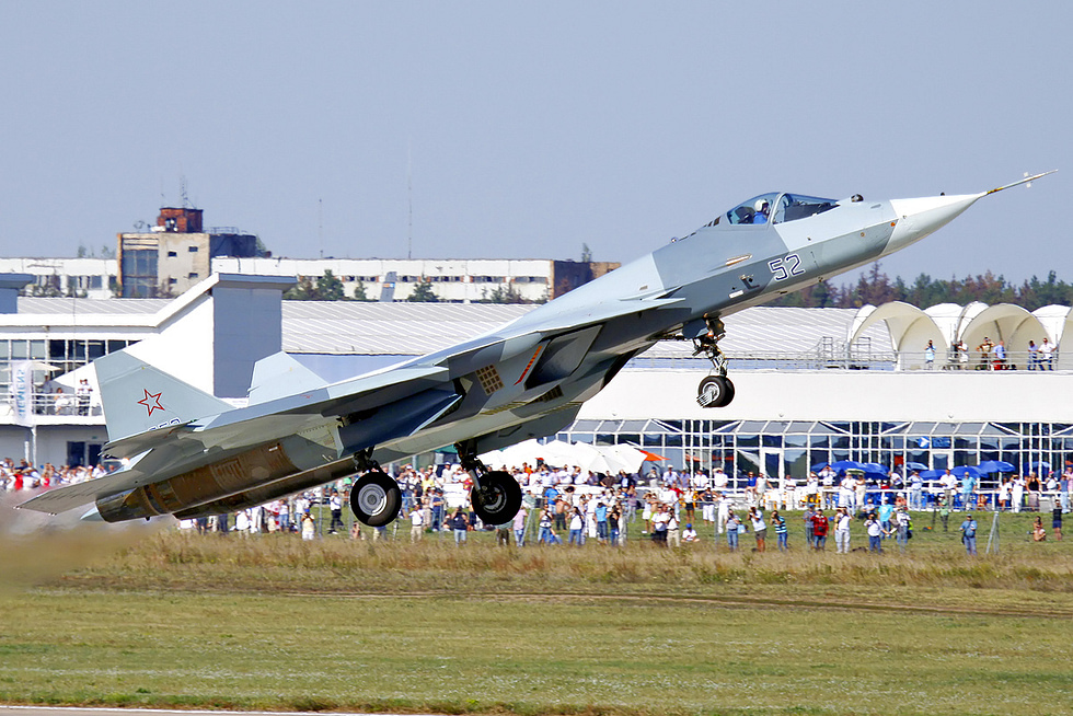 A T-50 prototype in flight in 2011, early in a long development.