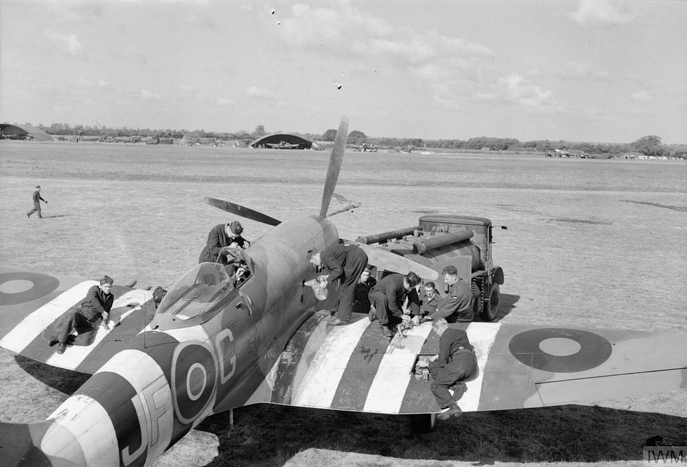 Ground crew refuel and re-arm a Tempest V of No. 3 Squadron at Newchurch during the V-1 battle.