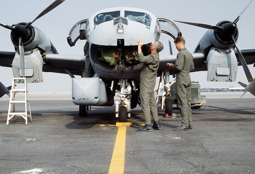 Pre-flight inspection of an OV-1D Mohawk during Operation Desert Storm, 1991.