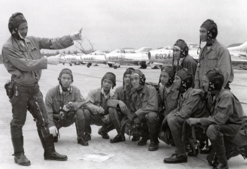 Vietnam Peoples Air Force pilots in front of Shenyang J-6 fighters.