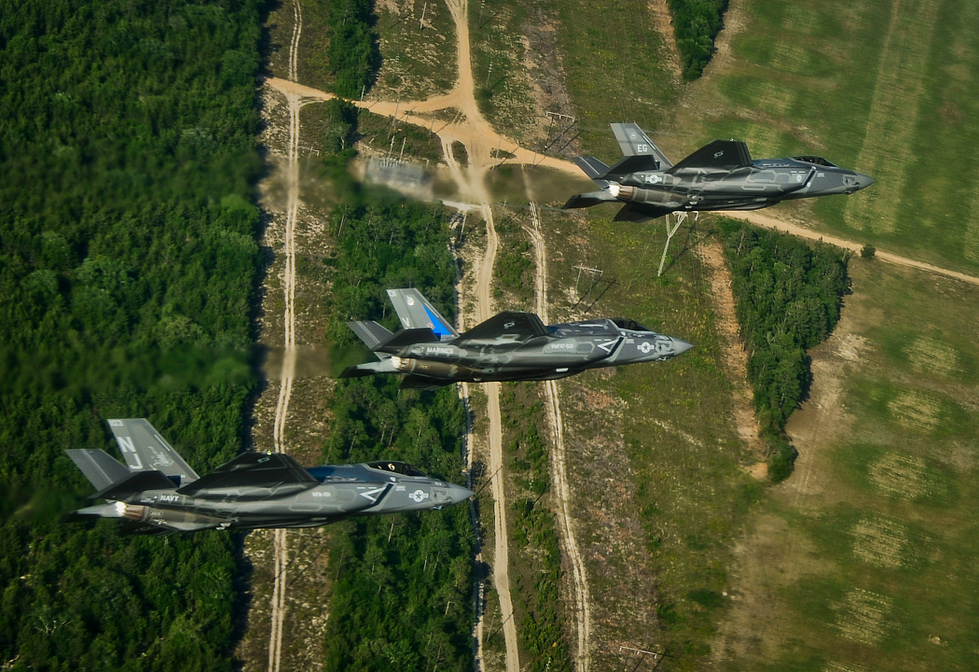 Three variants in formation the F-35A, F-35B and F-35C share one stealth airframe family.