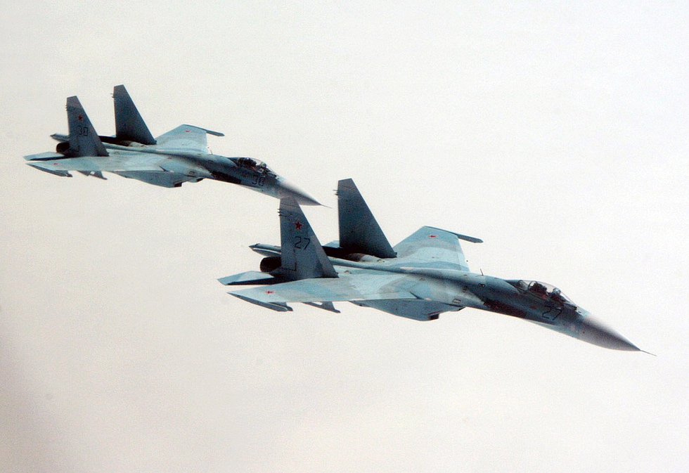 Two Russian Su-27 Flanker aircraft in flight during a NATO-area intercept.