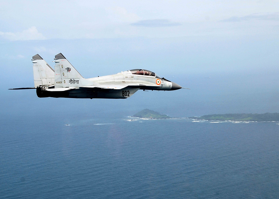 A navalised MiG-29K of the Indian Navy folding wings, reinforced gear and an arrestor hook.