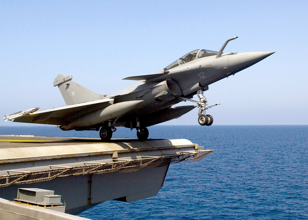 A French Navy Rafale M catapults from the deck of USS Enterprise during a cross-deck exercise.