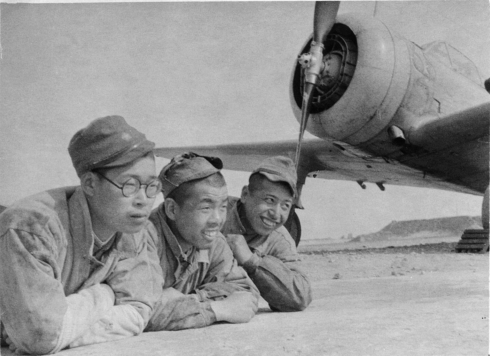 A Ki-27 with its ground crew a simple, rugged fighter built to work from rough strips.