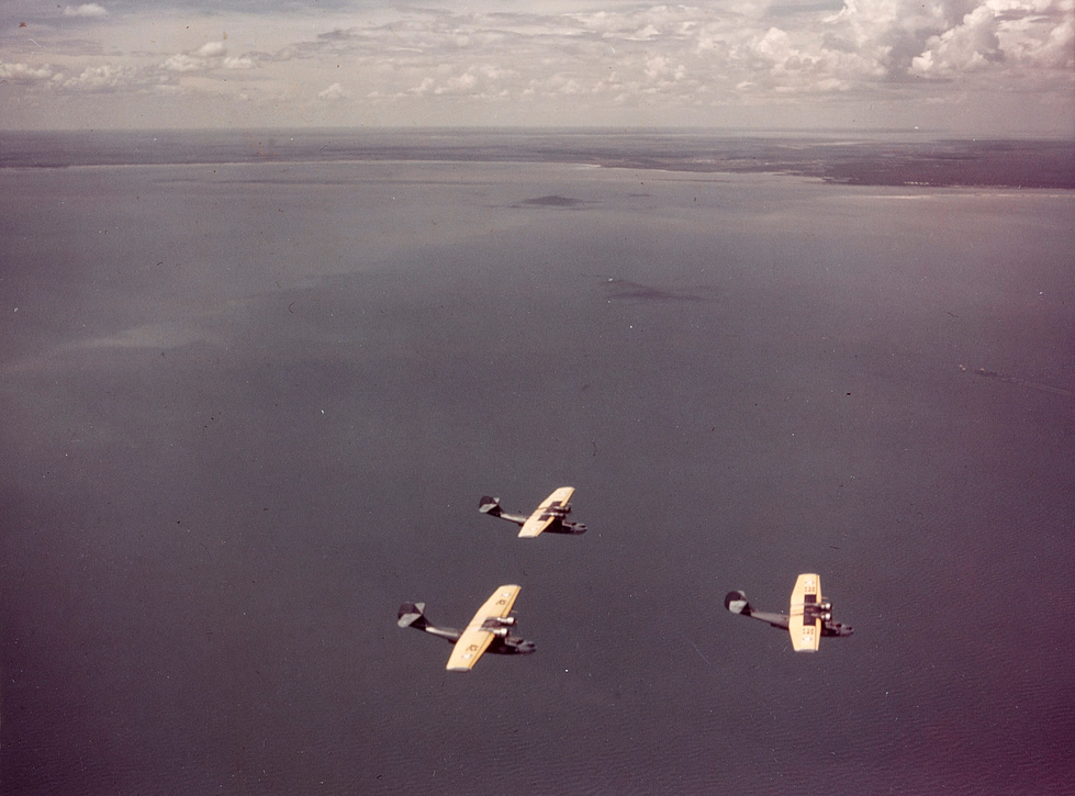 PBY-3 Catalina patrol planes flying in formation before the war.