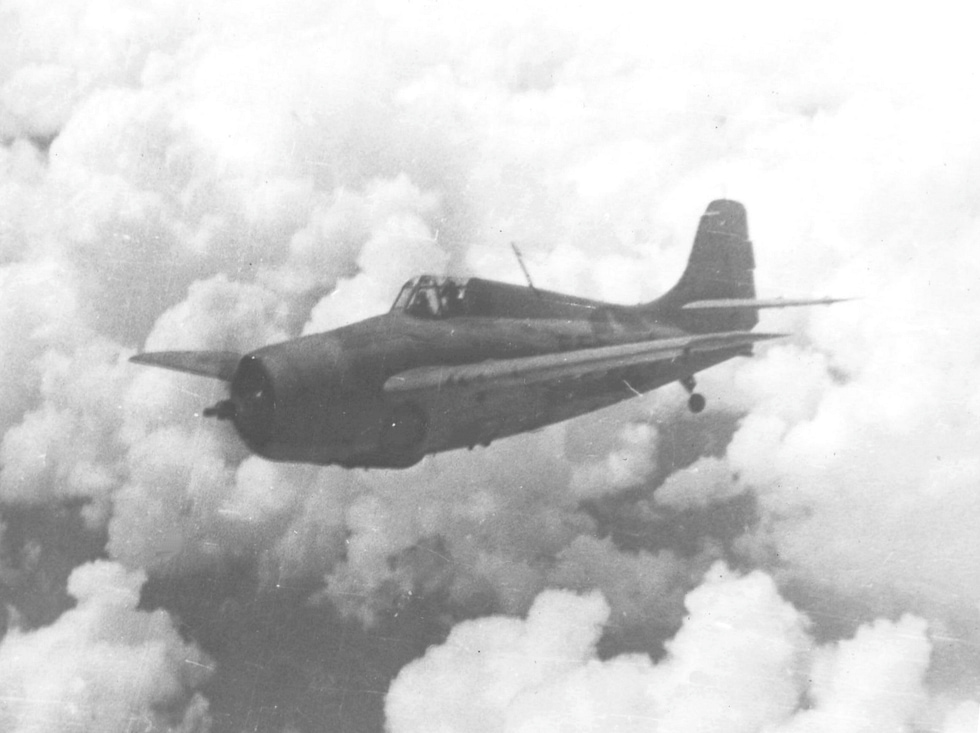 An F4F-4 Wildcat of VF-5 over the Solomons near Guadalcanal, 1942.
