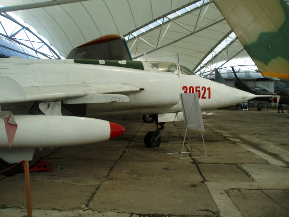 A preserved Nanchang A-5 at the Museum of Aviation in Koice the twin side intakes and solid nose that mark the MiG-19 redesign.
