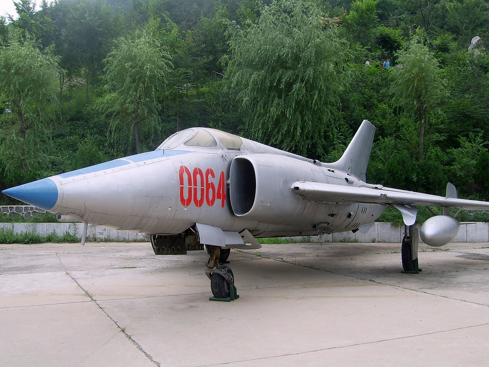 The Fantans signature look: a solid pointed nose for avionics and twin semicircular side intakes replacing the MiG-19s nose inlet.