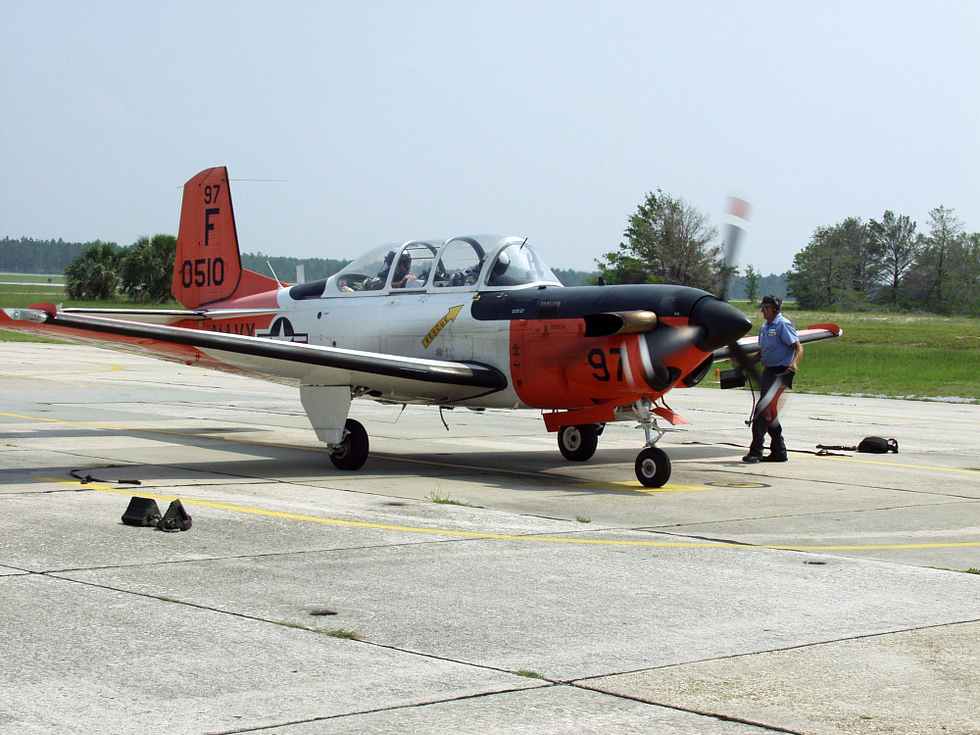 The last US Navy T-34C Turbo Mentor starts up before a final training flight.