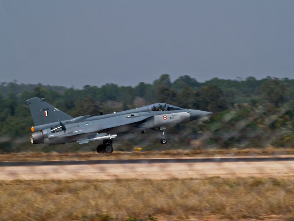 A HAL Tejas in flight Indias indigenous lightweight multirole fighter.