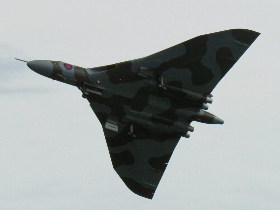 The Vulcan climbing away under power the moment the Olympus intakes begin to howl.