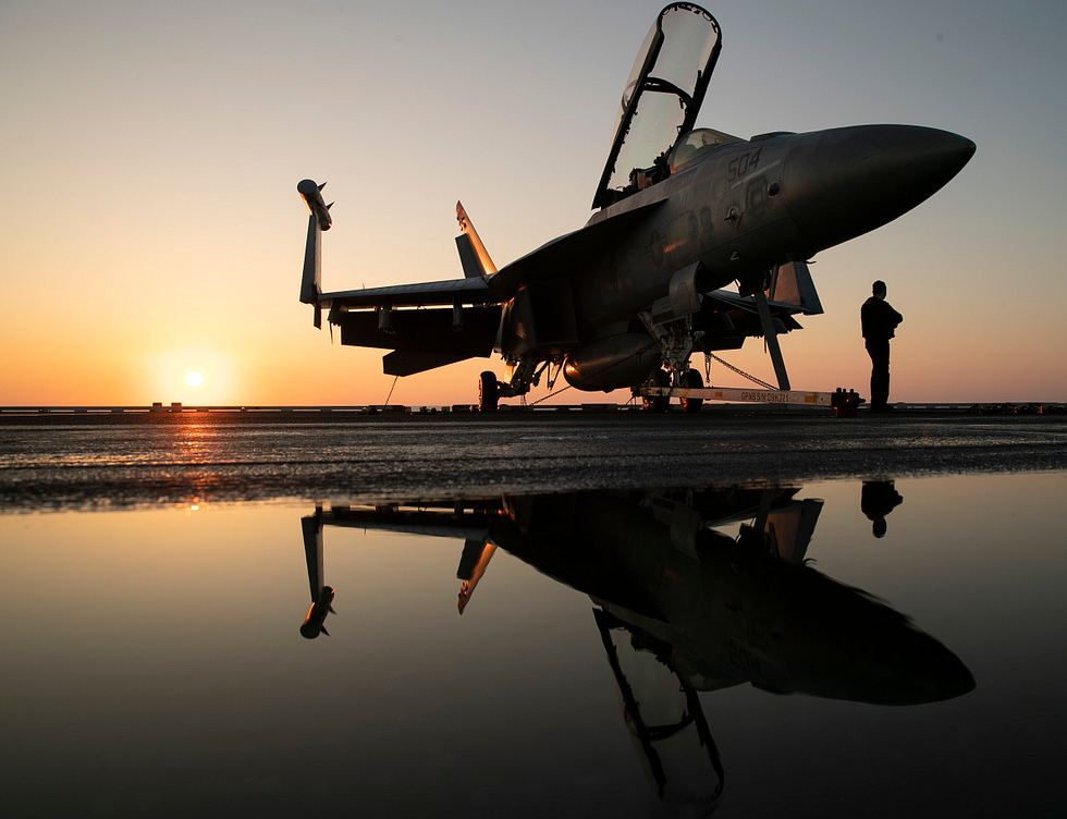 An EA-18G Growler at sunrise the Super Hornet-based electronic-attack aircraft.