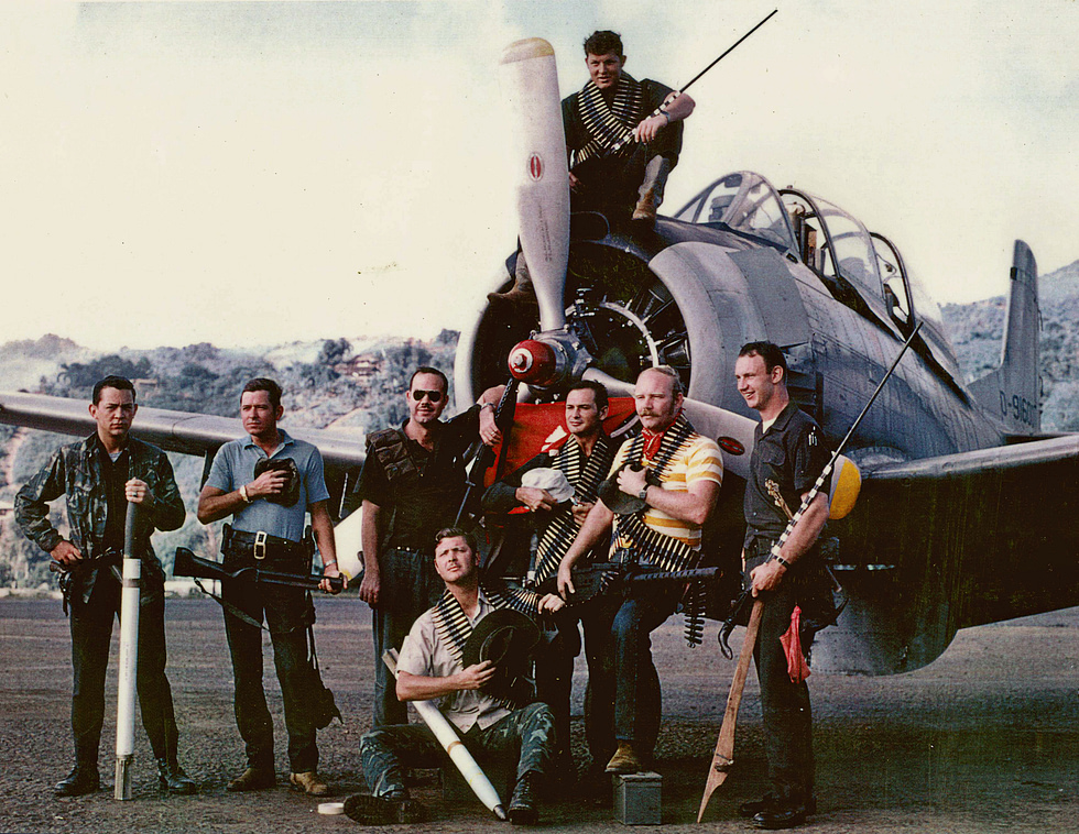 Raven forward air controllers with a T-28D Trojan at the secret base of Long Tieng, Laos, 1970.