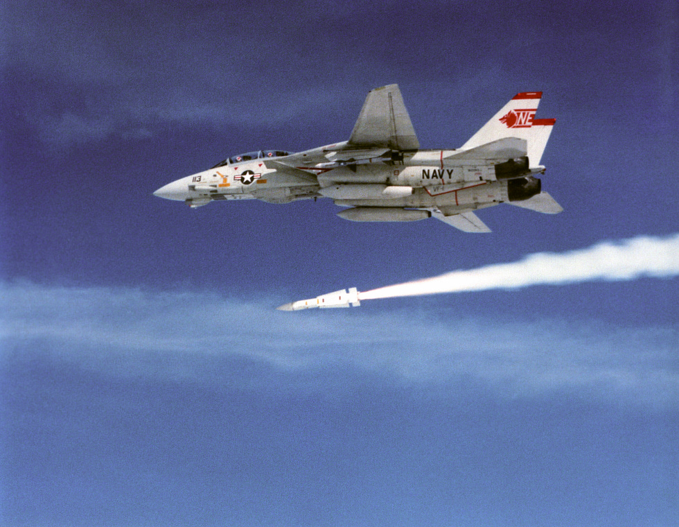 An F-14A of VF-1 launching an AIM-54 Phoenix the Tomcats signature 100-mile missile.