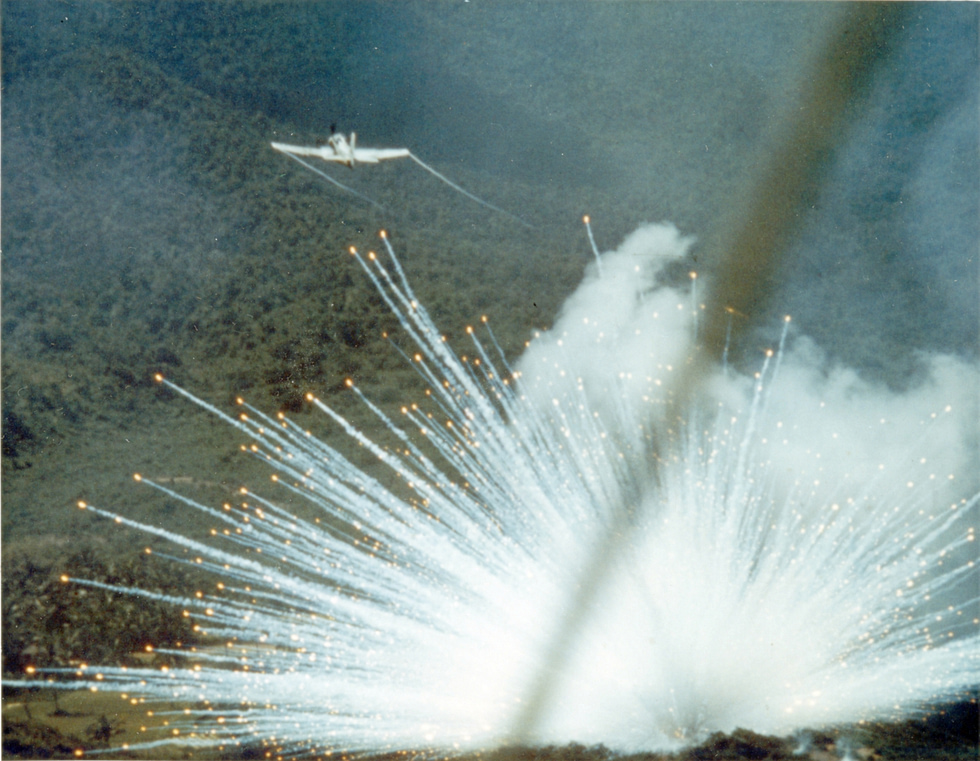 A USAF A-1E releases a bomb over Vietnam in 1966 close air support, low and slow.