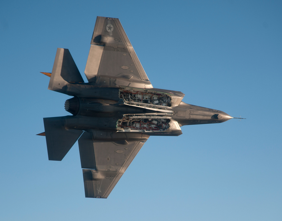An F-35 shows its internal weapons bay in stealth mode, every weapon is carried inside.