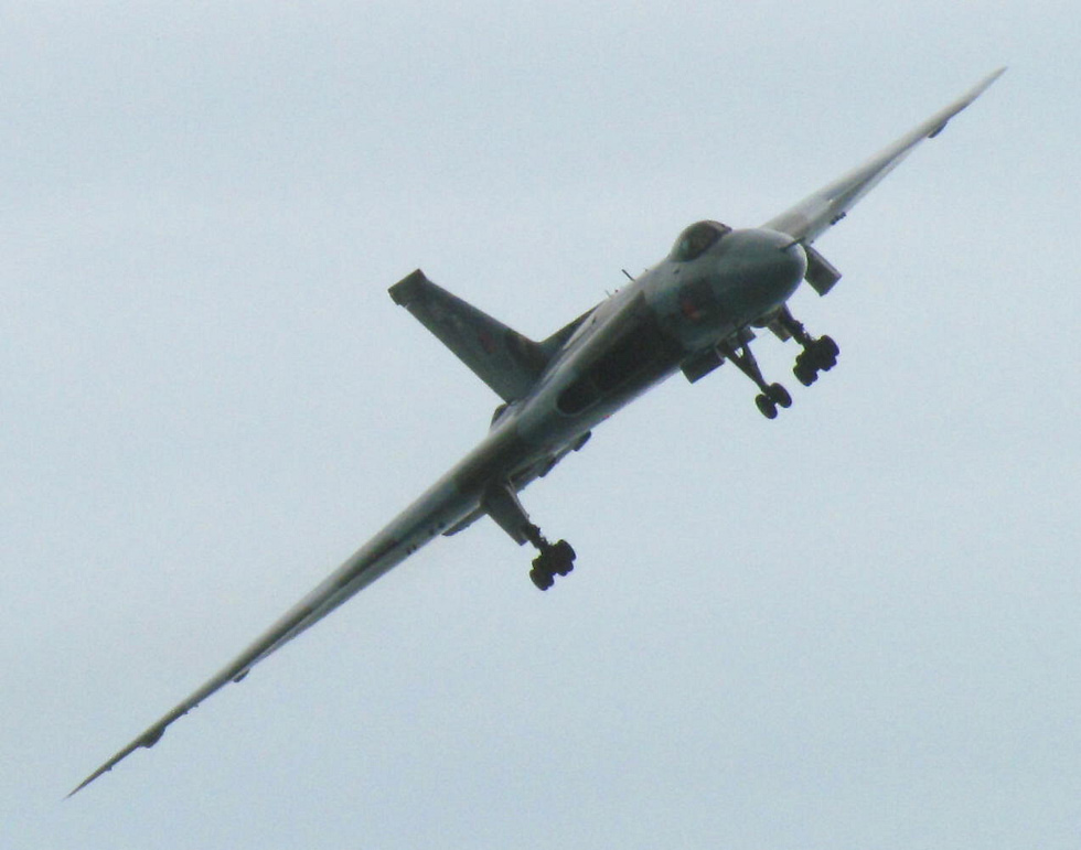 XH558 wheeling overhead at a British air show the vast triangular wing filling the sky.