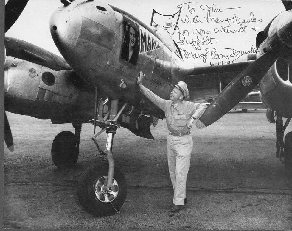 Richard Bong, Americas top ace, with his P-38 Marge.