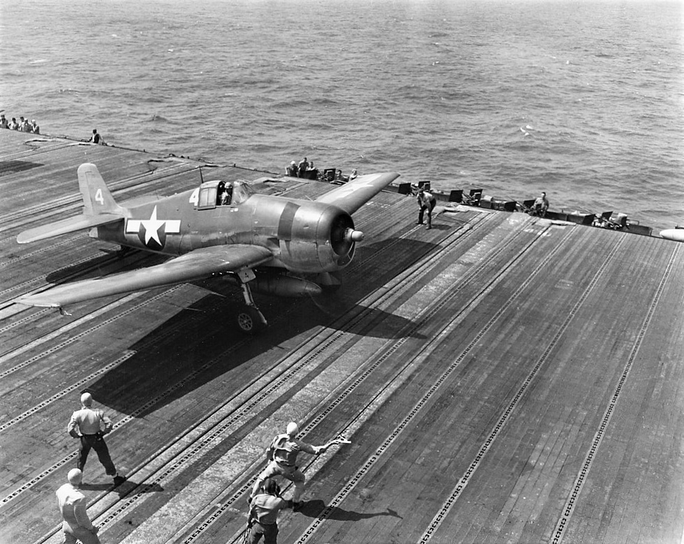 A VF-16 Hellcat launches from USS Lexington for a raid on Formosa, October 1944.