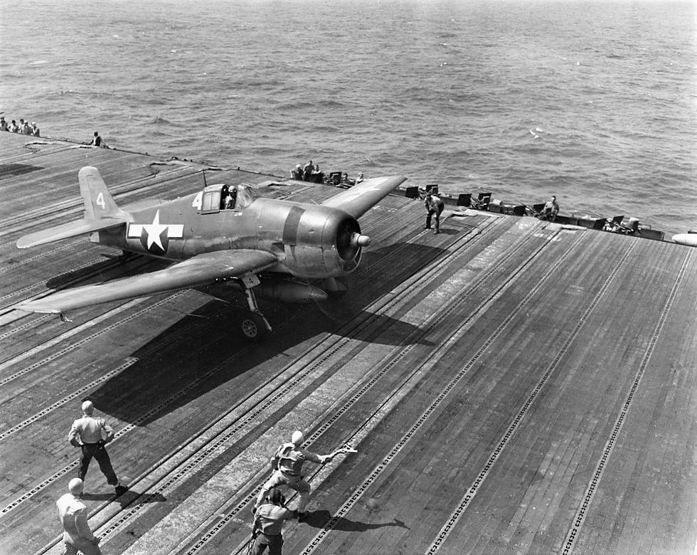 A VF-16 Hellcat launches from USS Lexington for a raid on Formosa, October 1944.