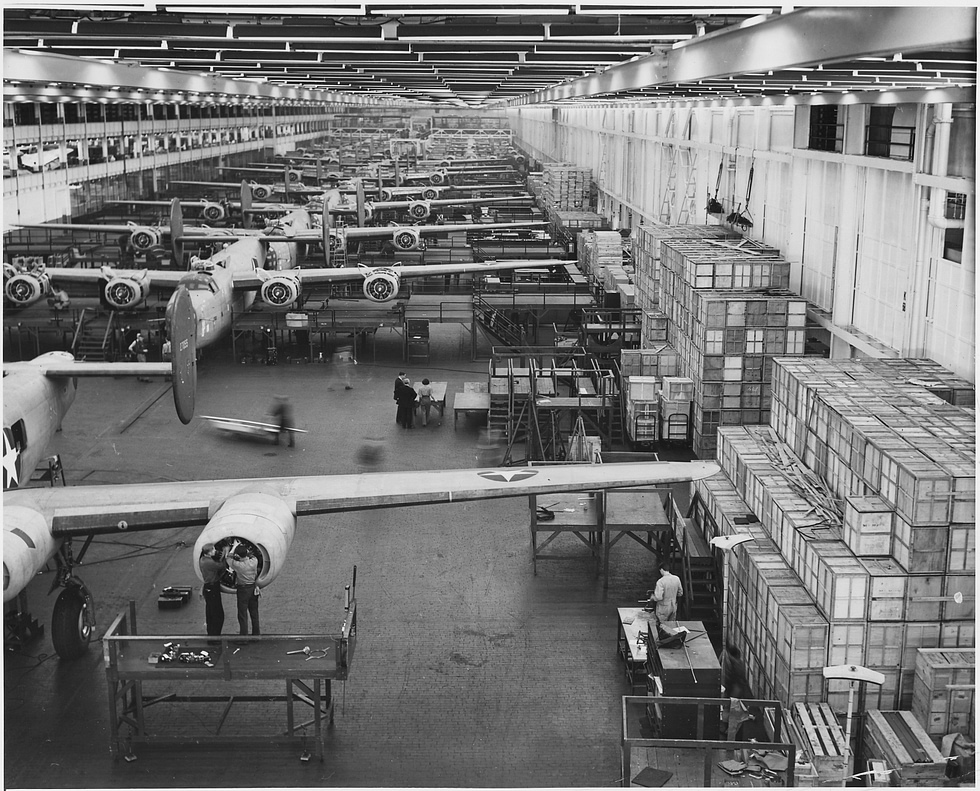 B-24s on the assembly line at Fords mile-long Willow Run plant, where output peaked at a bomber an hour.