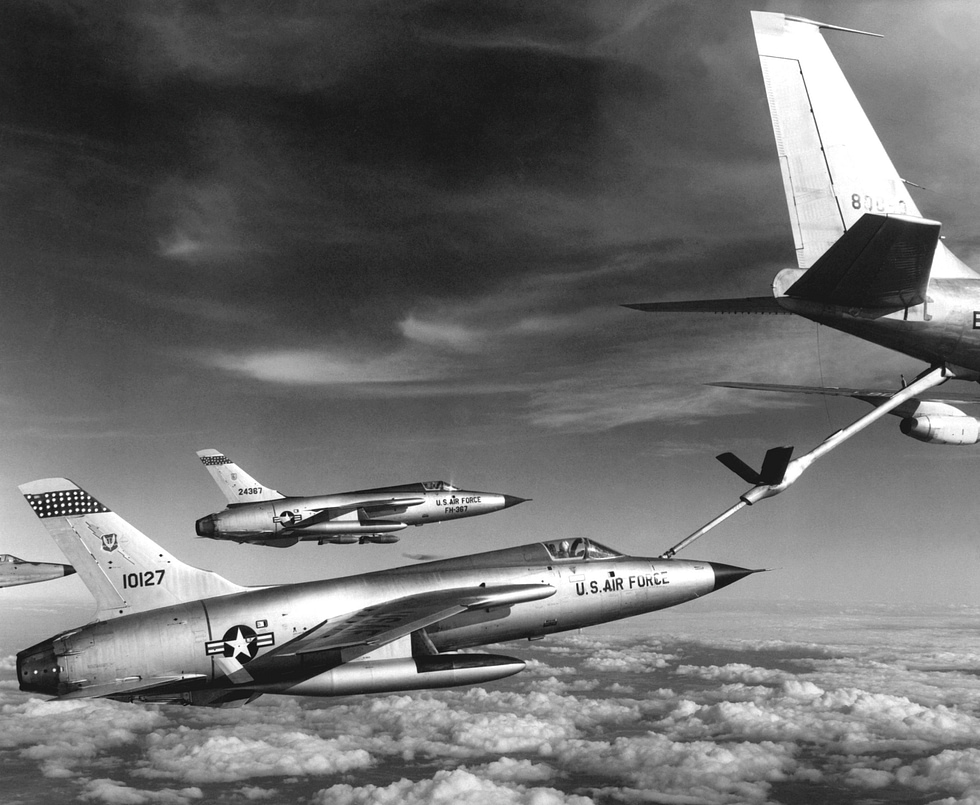 Thunderchiefs take on fuel from a tanker before pressing north the Thuds legs were short.