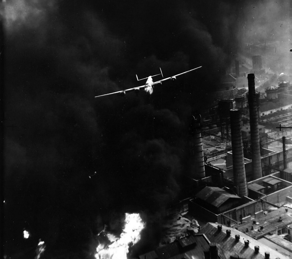 The Sandman roars out of the smoke at treetop height over Ploesti, 1 August 1943.