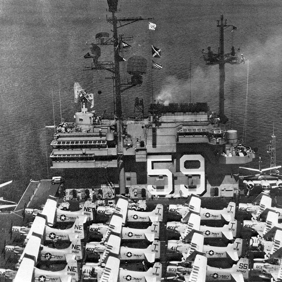 Sixteen AD Skyraiders crowd the deck of USS Forrestal in 1957 the Navys carrier attack backbone.