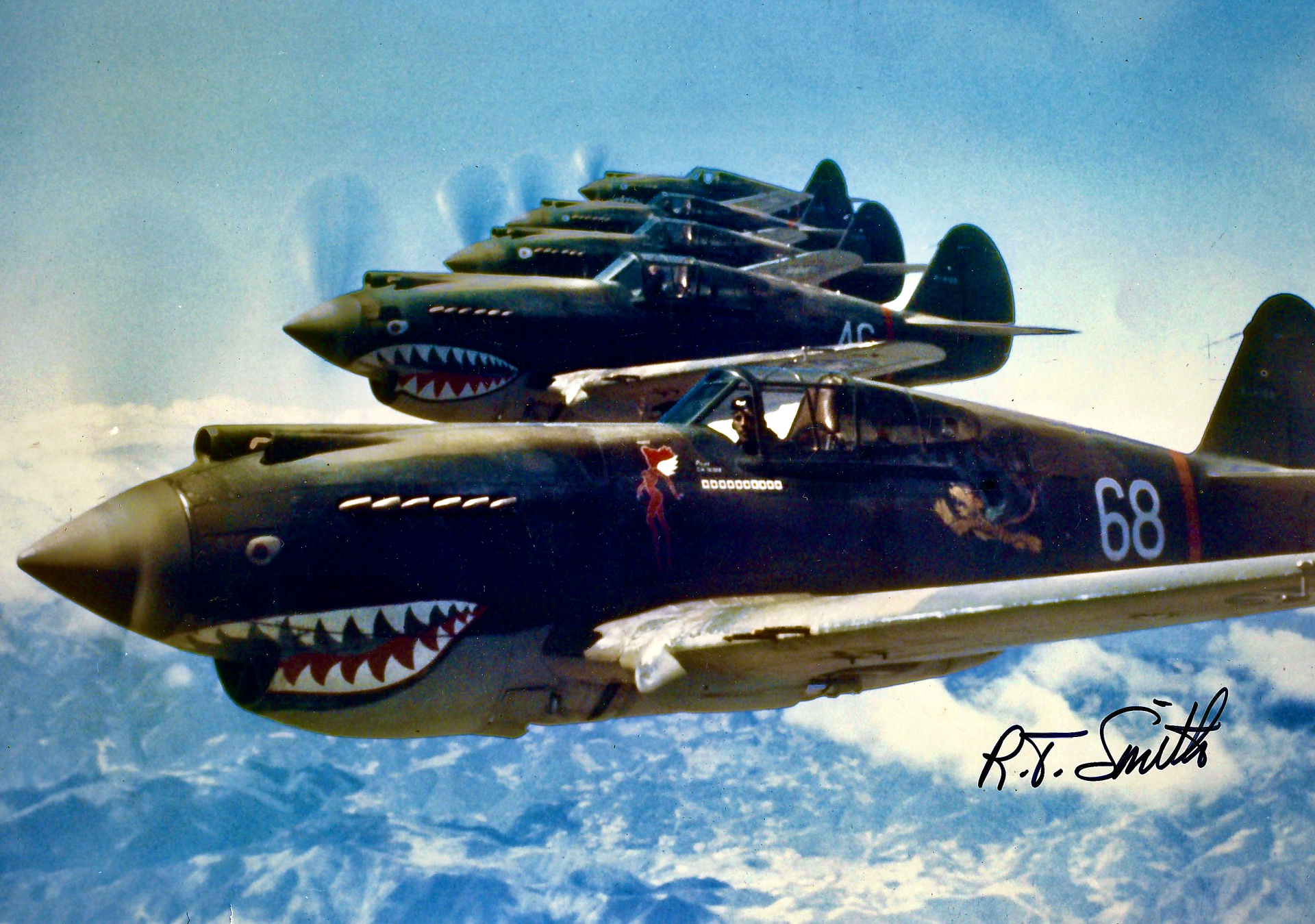 Curtiss P-40 Warhawk fighters of the Flying Tigers with shark-mouth nose art in flight, 1942