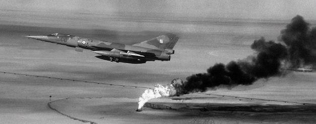 A Mirage IV on a reconnaissance run over burning Kuwaiti oil fields in 1991 the recon role that outlived the bomb.