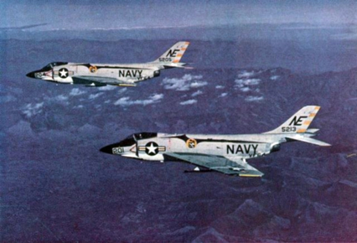 F3H-2 Demons of squadron VF-64 in formation, 1958 the 35-degree swept wing and single tail up close.