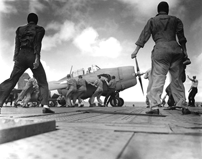A folded F4F-4 Wildcat aboard USS Enterprise (CV-6), October 1942.