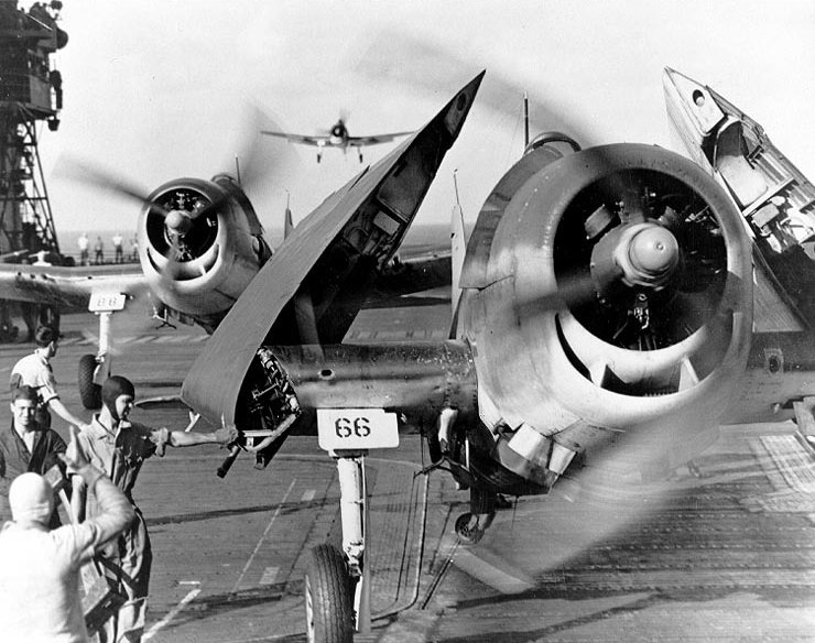 F6F-3 Hellcats of VF-10 recover aboard USS Enterprise during the Pacific war.
