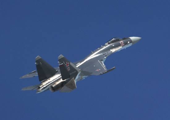 A Su-35S close-up the strengthened airframe and heavy 12-hardpoint Flanker layout.