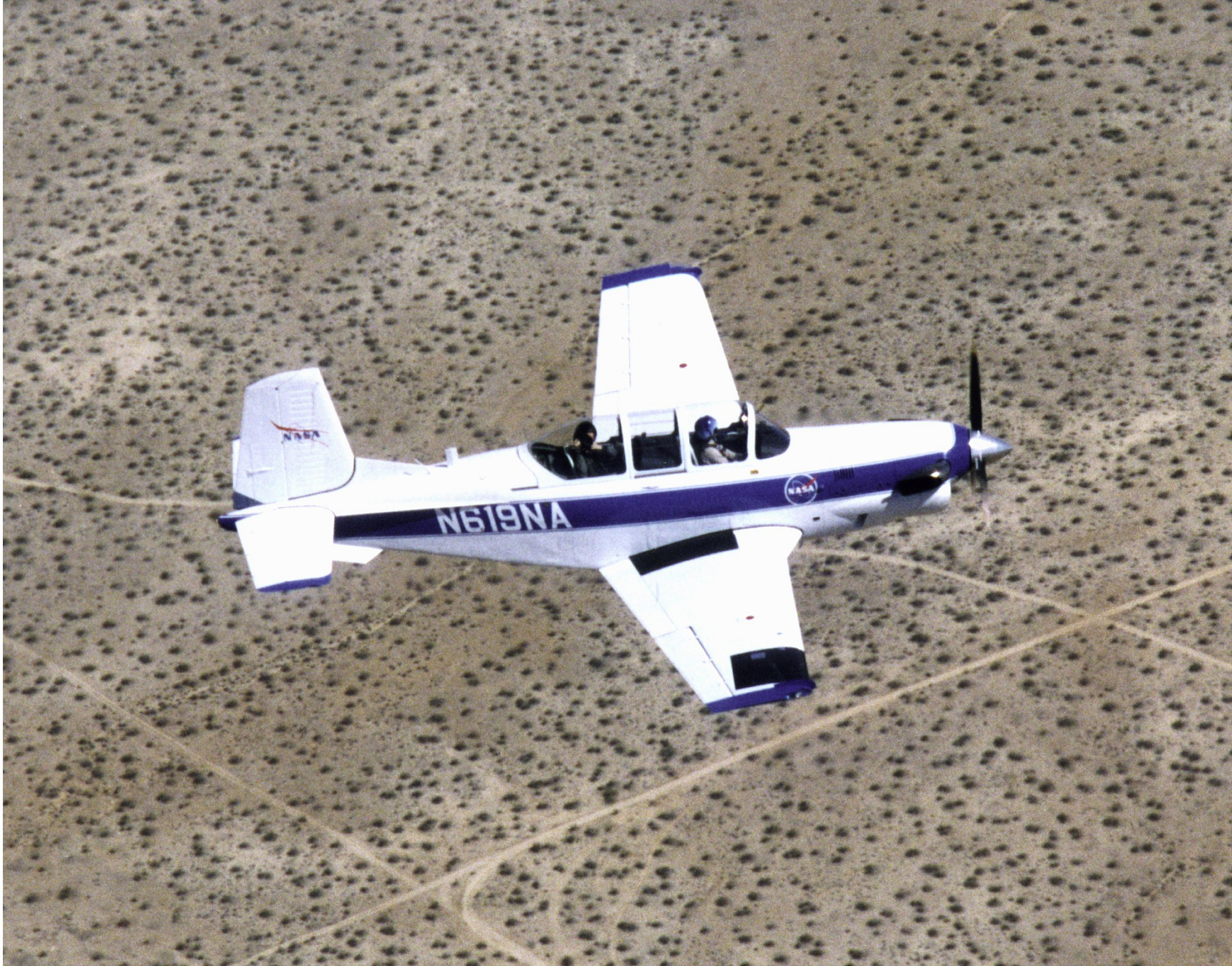 Beechcraft T-34C Turbo Mentor military primary trainer in flight