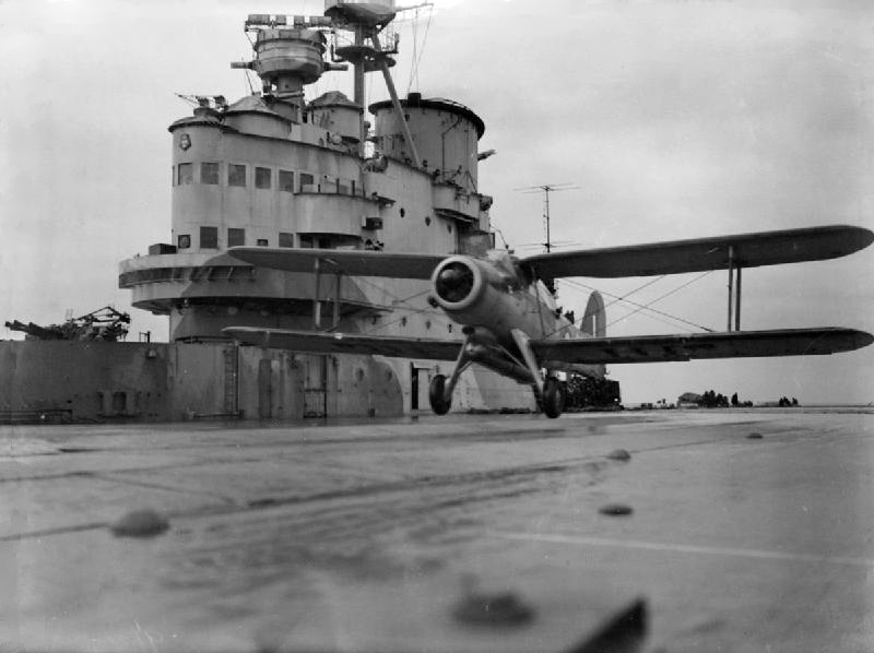 A torpedo-carrying Fairey Albacore of 820 Squadron, Fleet Air Arm, taking off from the flight deck of HMS Victorious. Photo: Lt C. H. Parnall, Royal Navy official photographer — Imperial War Museum collection (public domain).
